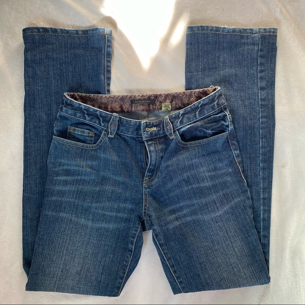 Mid rise darkwash denim jeans by Elie Tahari